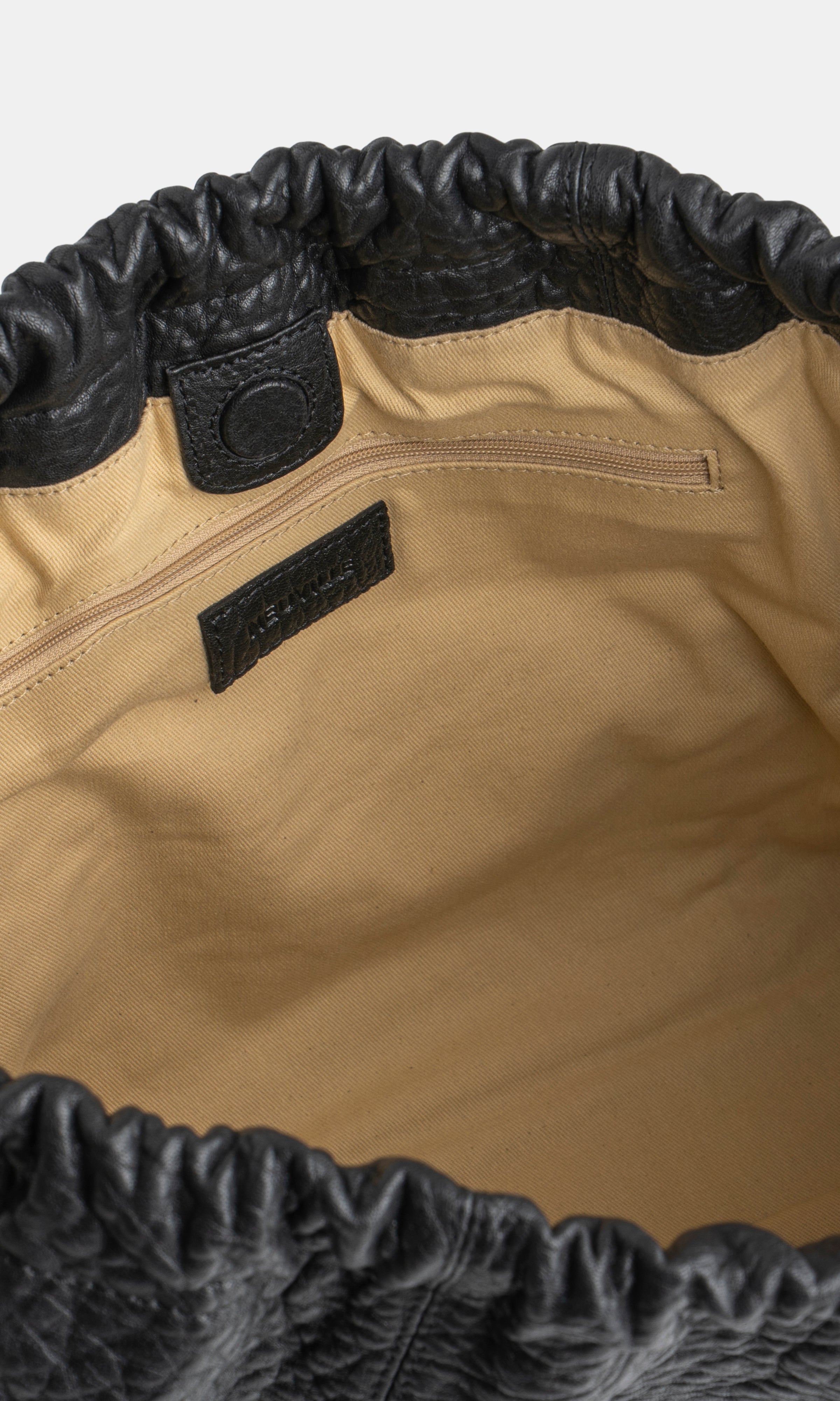 detailed inside shot of the Elliot bag