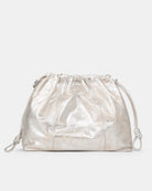 Elliot Sand Gold metallic drawstring shoulder bag on a white background. Neuville bag. Front side