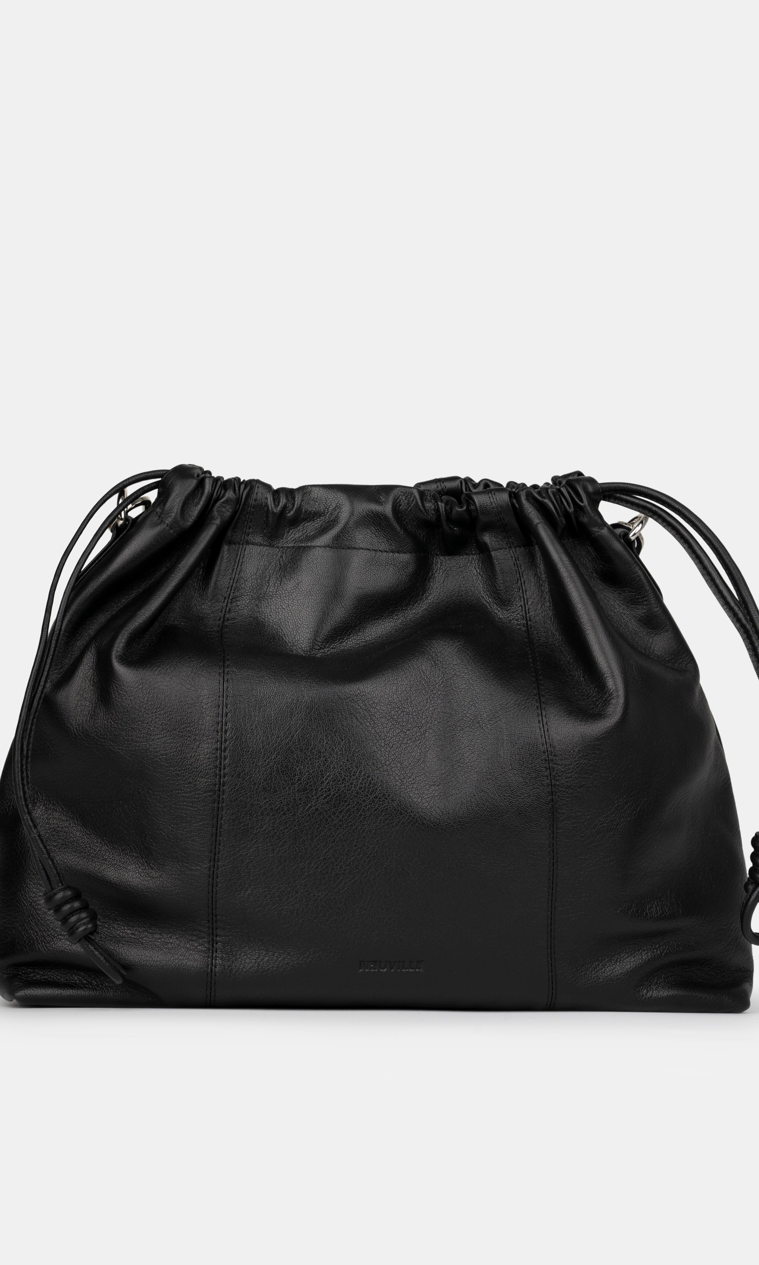 Black leather shoulder and crossbody bag  with drawstring on a light gray background. Front Photo of Elliot Black Neuville without strap