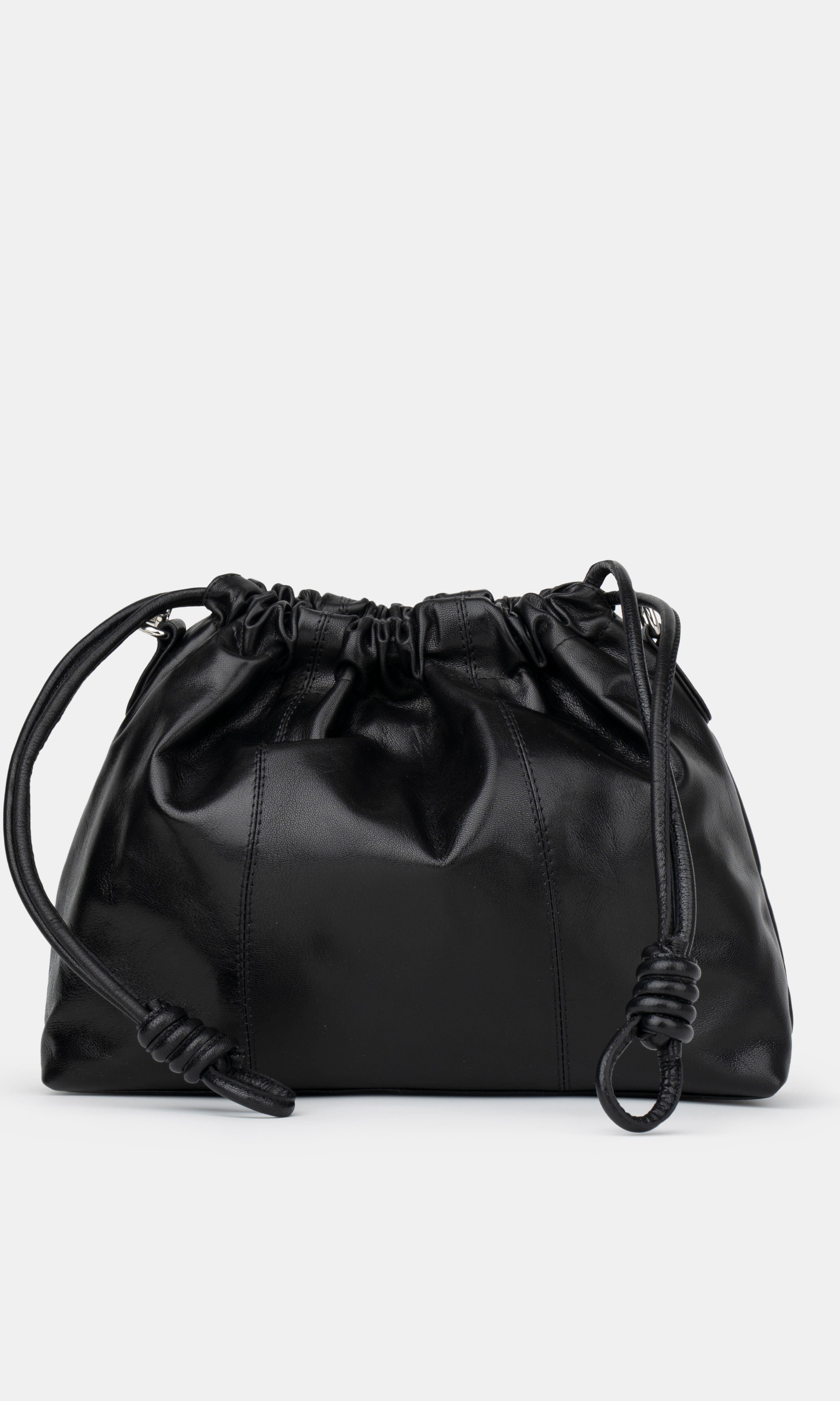 Black drawstring bag on a light gray background