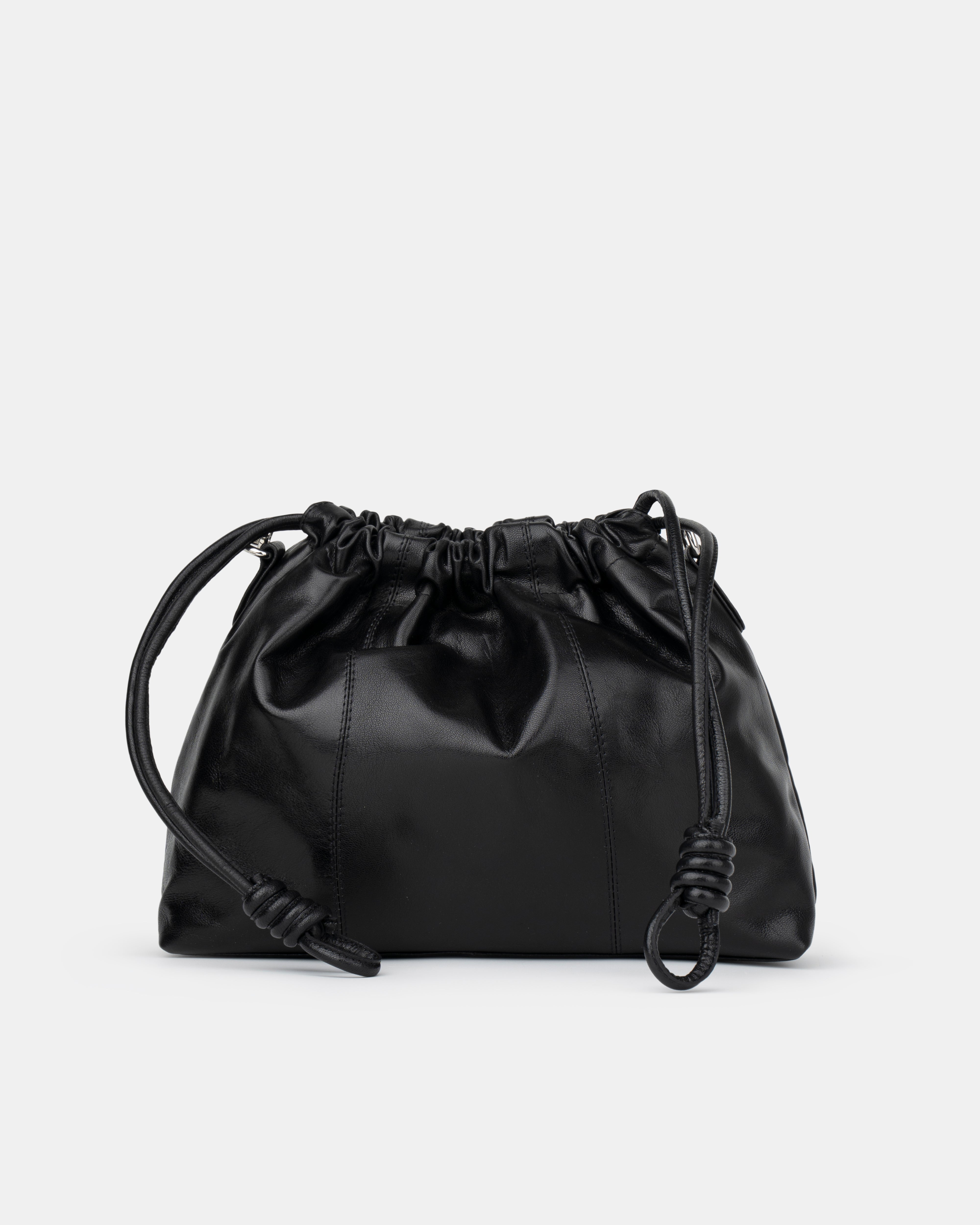 Black drawstring bag on a light gray background