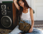 woman wearing Maxke Suede Khaki leather shoulder of the brand Neuville