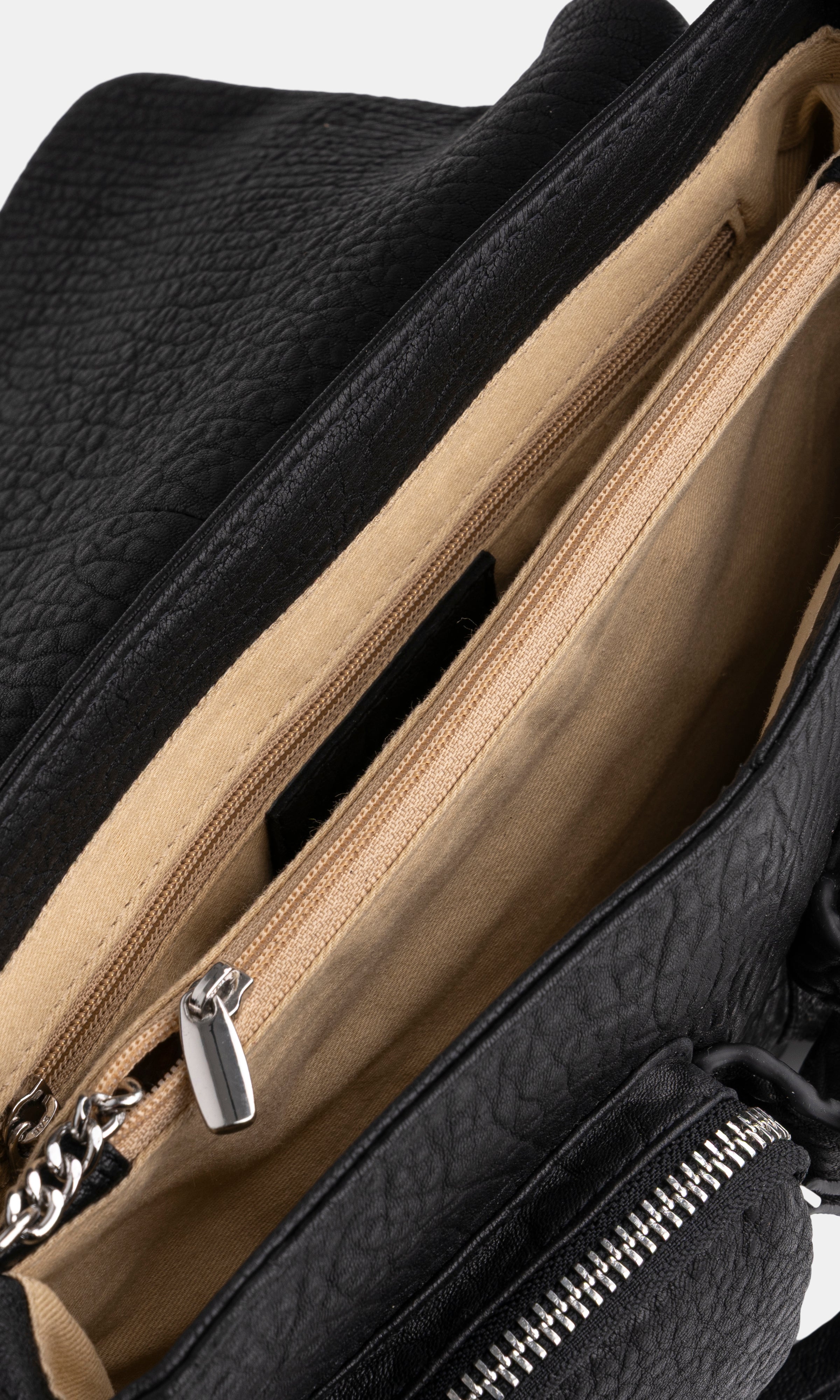 Maxke Black Leather shoulder - and crossbody bag with golden hardware of the brand Neuville. Detailed photo of the inside of the bag