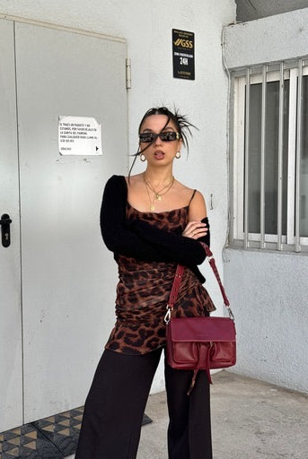 Maxke Burgundy leather bag on model