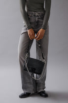 Maxke Black leather bag Neuville in studio