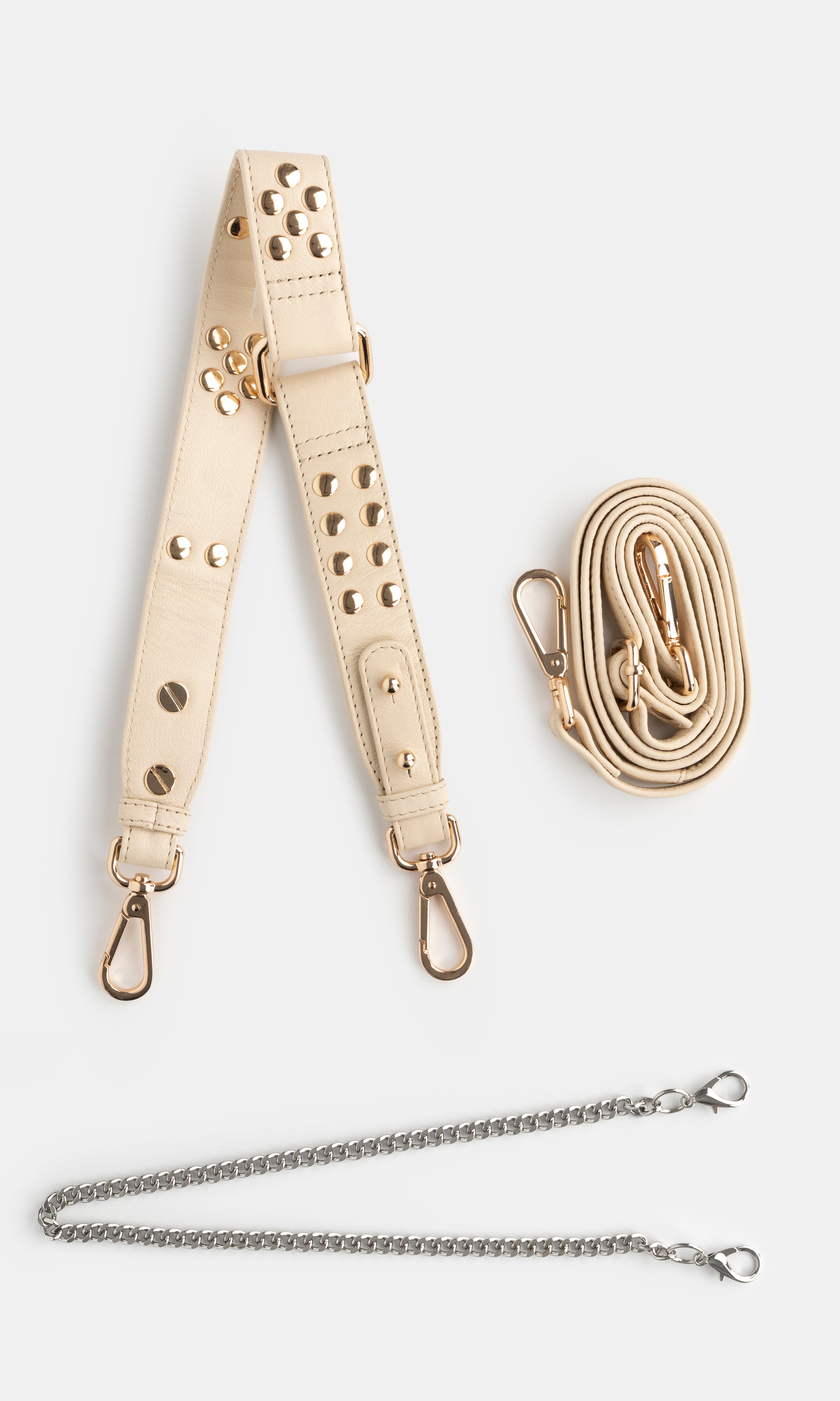 Beige leather strap with metal hardware and a golden chain on a white background