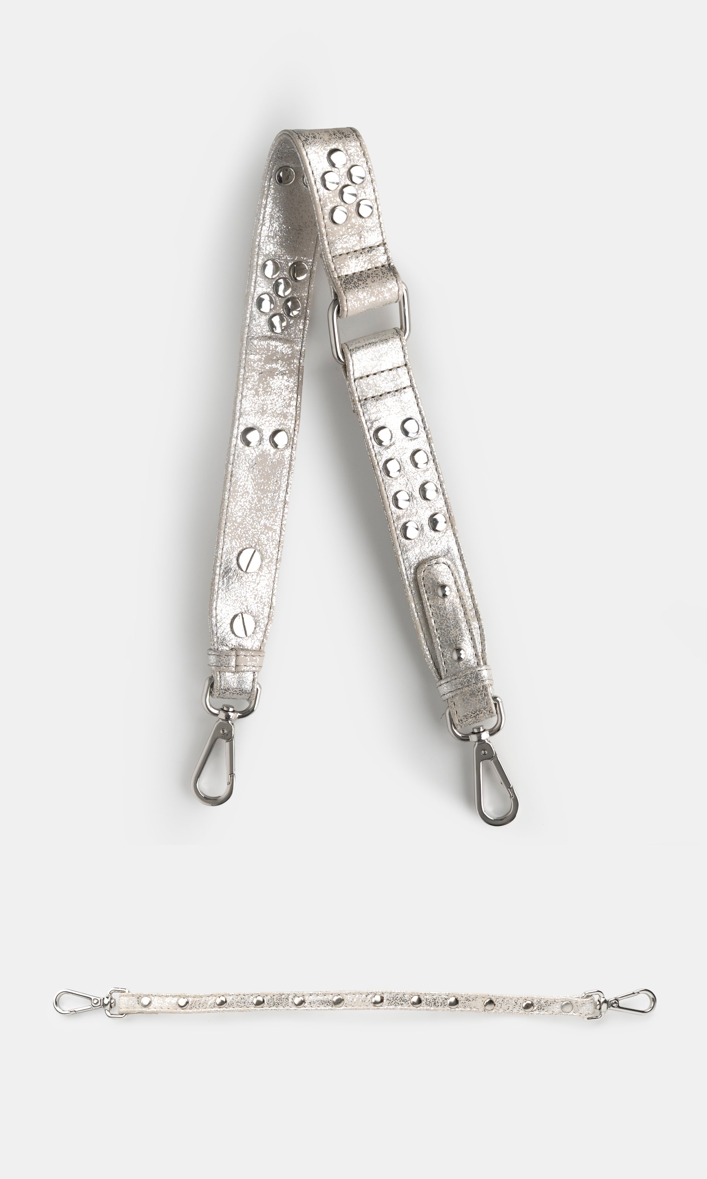 Metallic strap with decorative elements on a white background