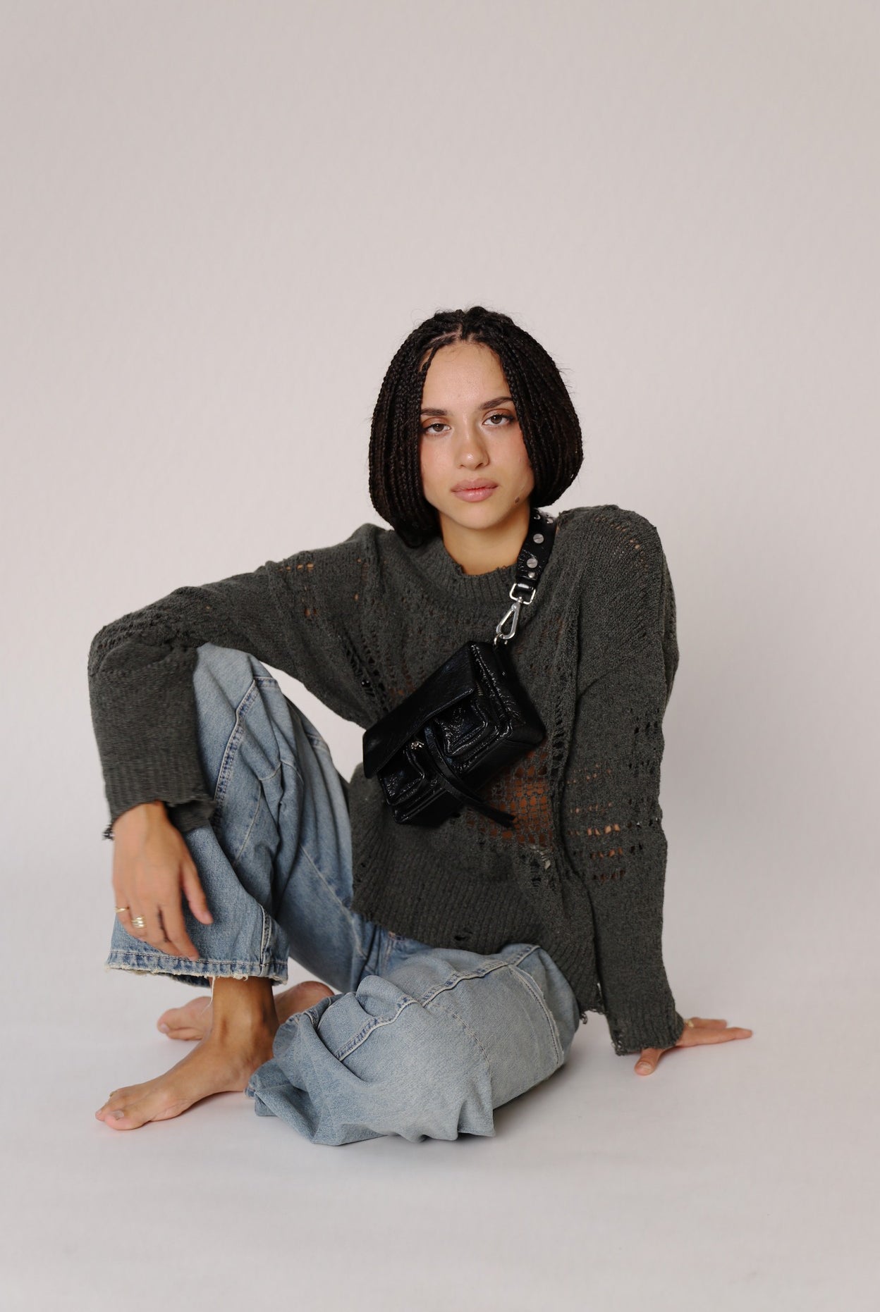 Max Mini crunch Black Leather bag Neuville, model on bag