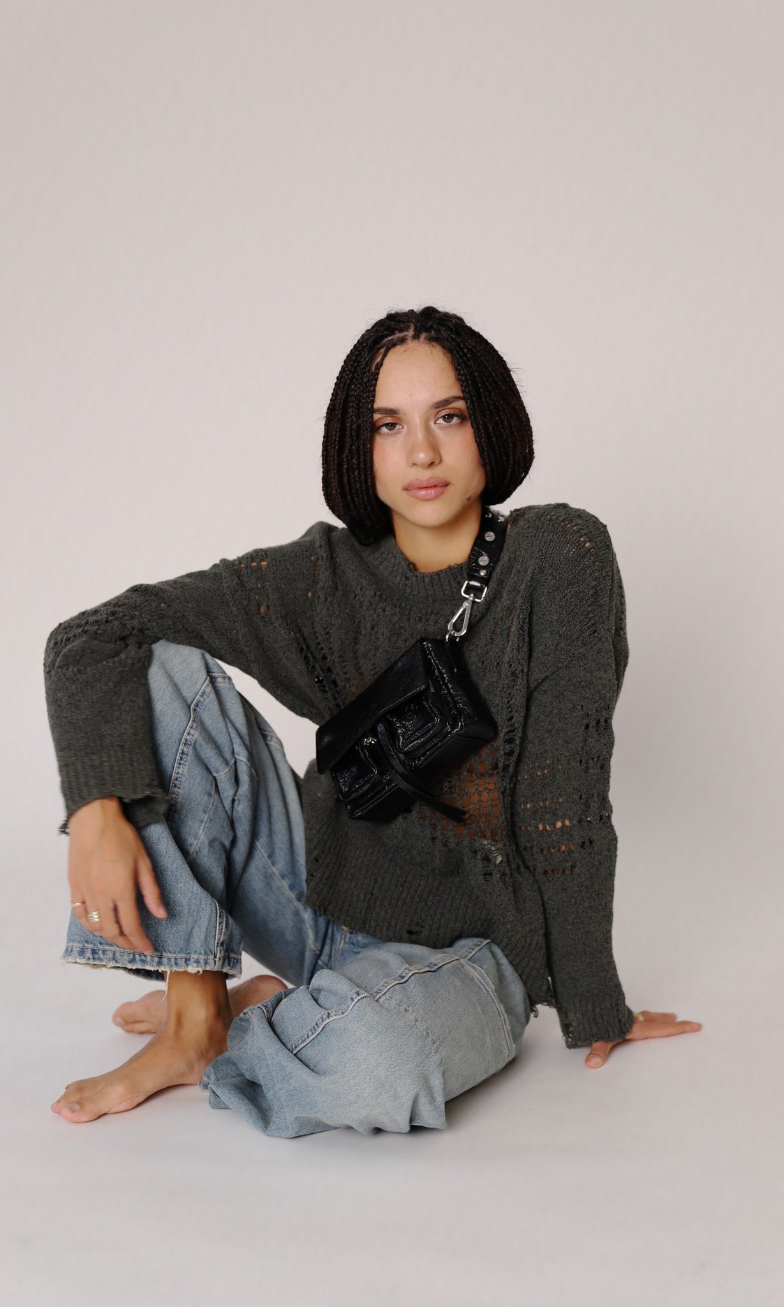 Max Mini crunch Black Leather bag Neuville, model on bag