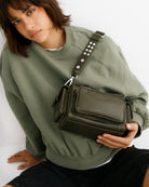 Box Green Bag Neuville, Leather shoulder and crossbody bag on model