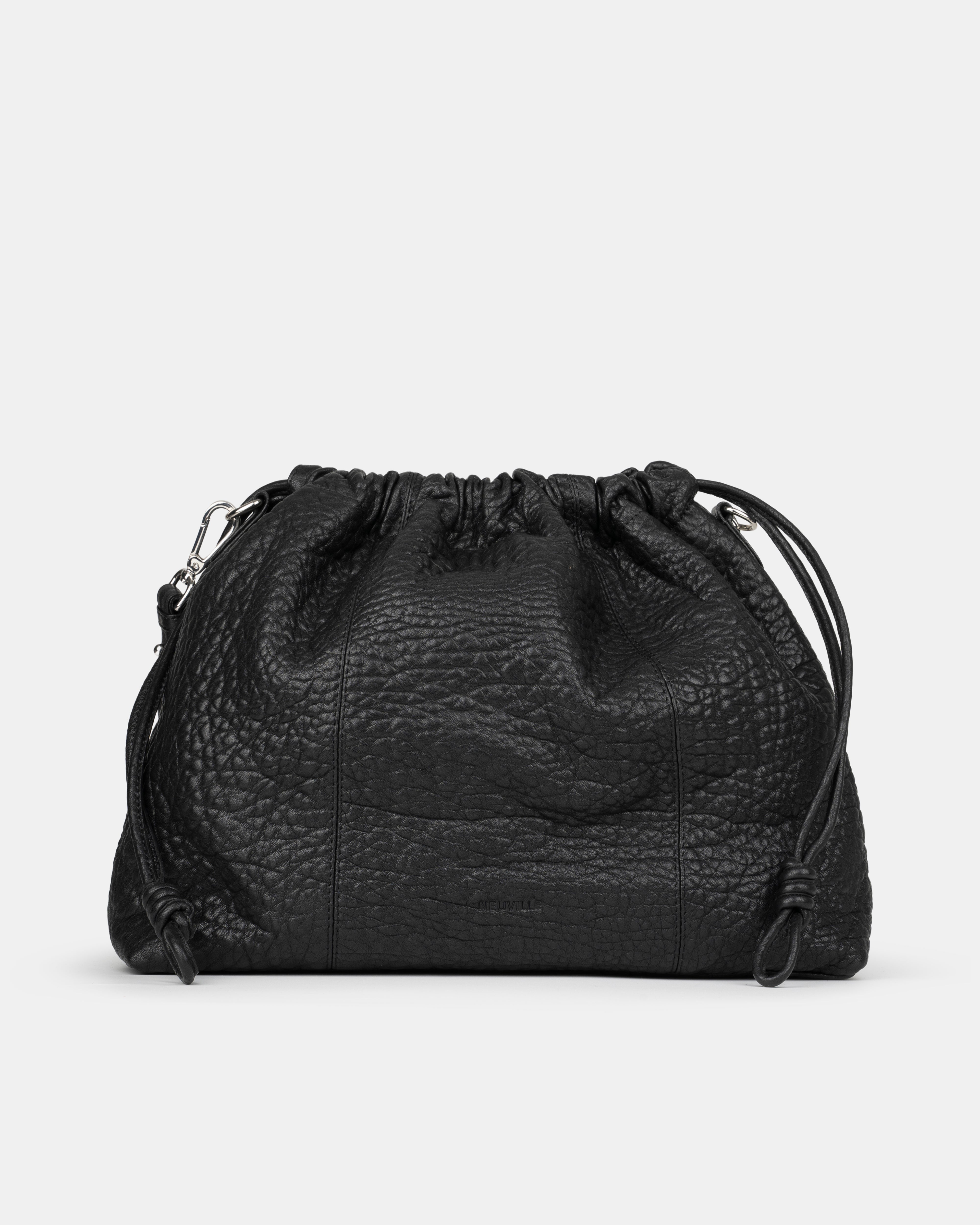 Black leather drawstring bag on a light gray background