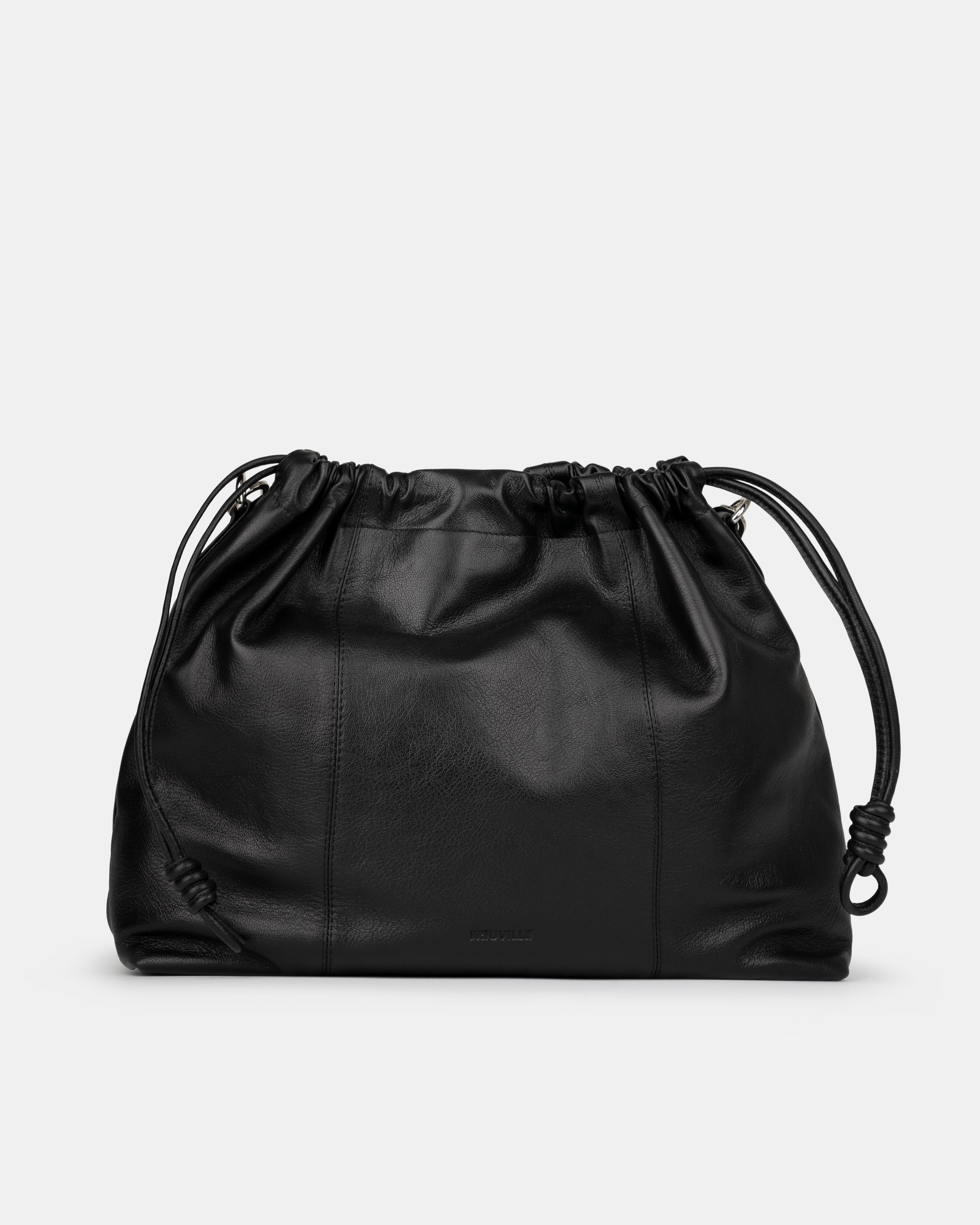 Black leather shoulder and crossbody bag  with drawstring on a light gray background. Front Photo of Elliot Black Neuville without strap