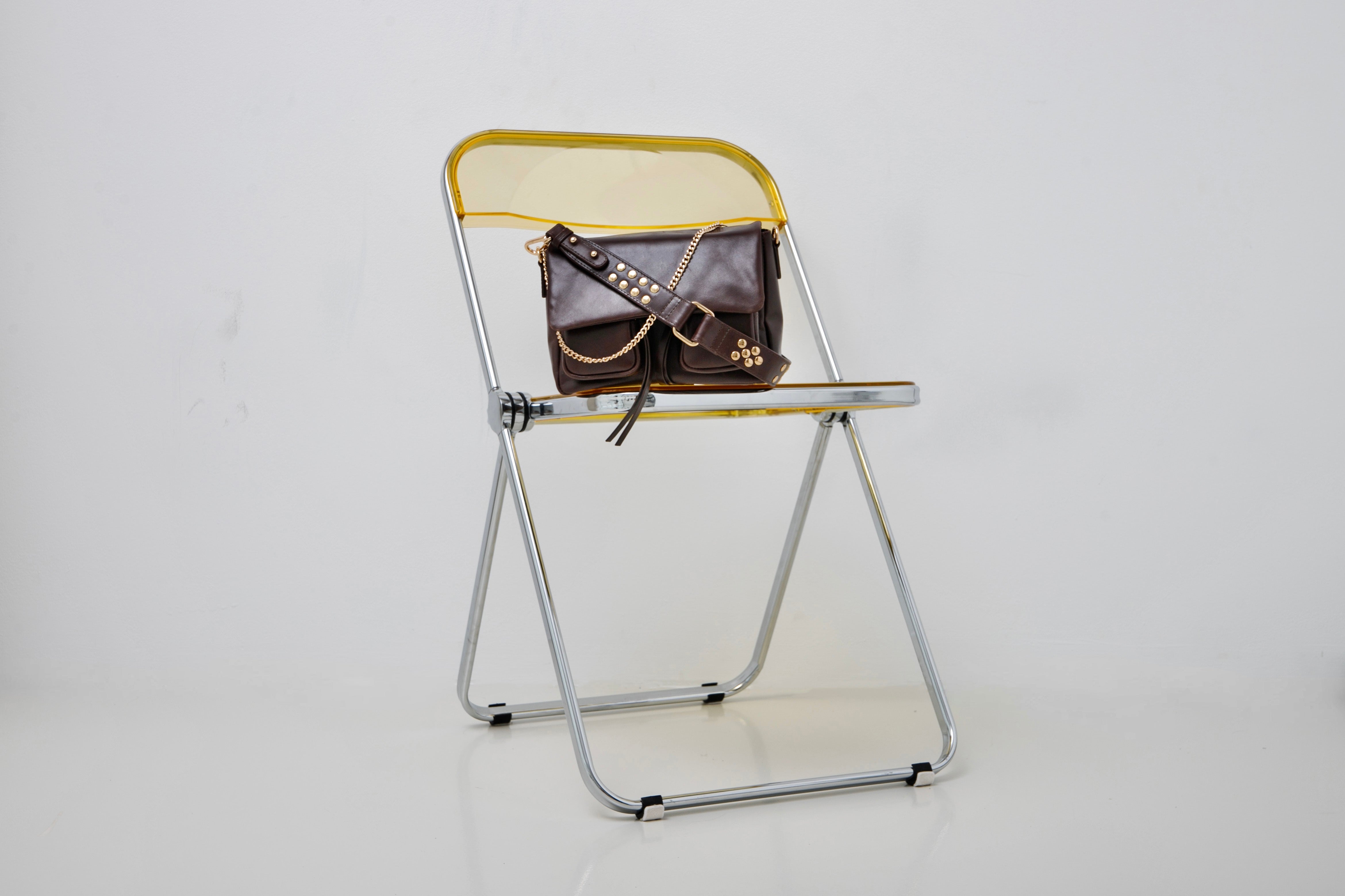 Maxke Chocolate with golden details of Neuville bags. 