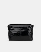 Black handbag on a light gray background
