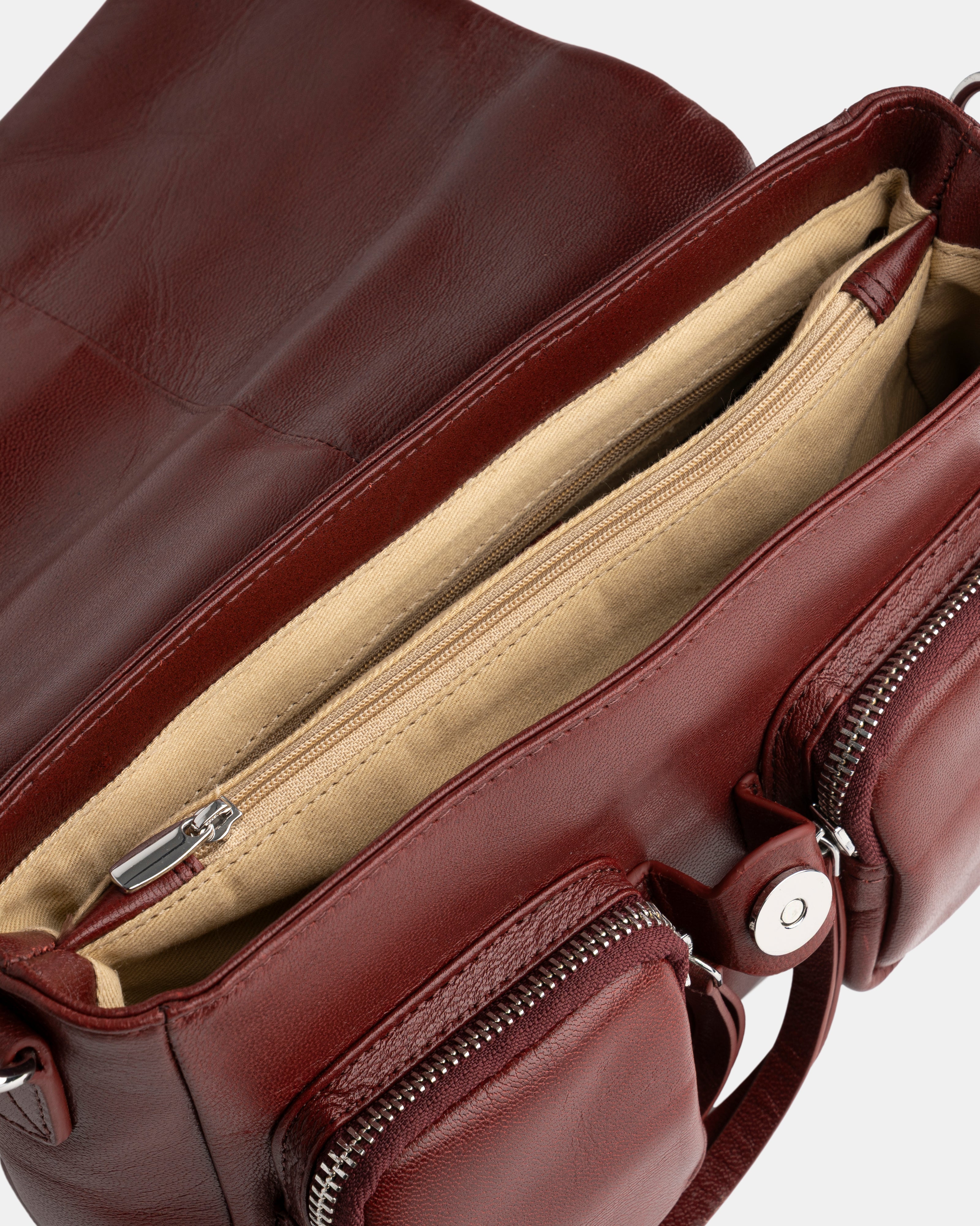 Maxke  Burgundy Leather shoulder - and crossbody bag with golden hardware of the brand Neuville. Detailed photo of the inside