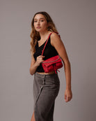 Max mini red coral leather bag, on model worn as shoulderbag