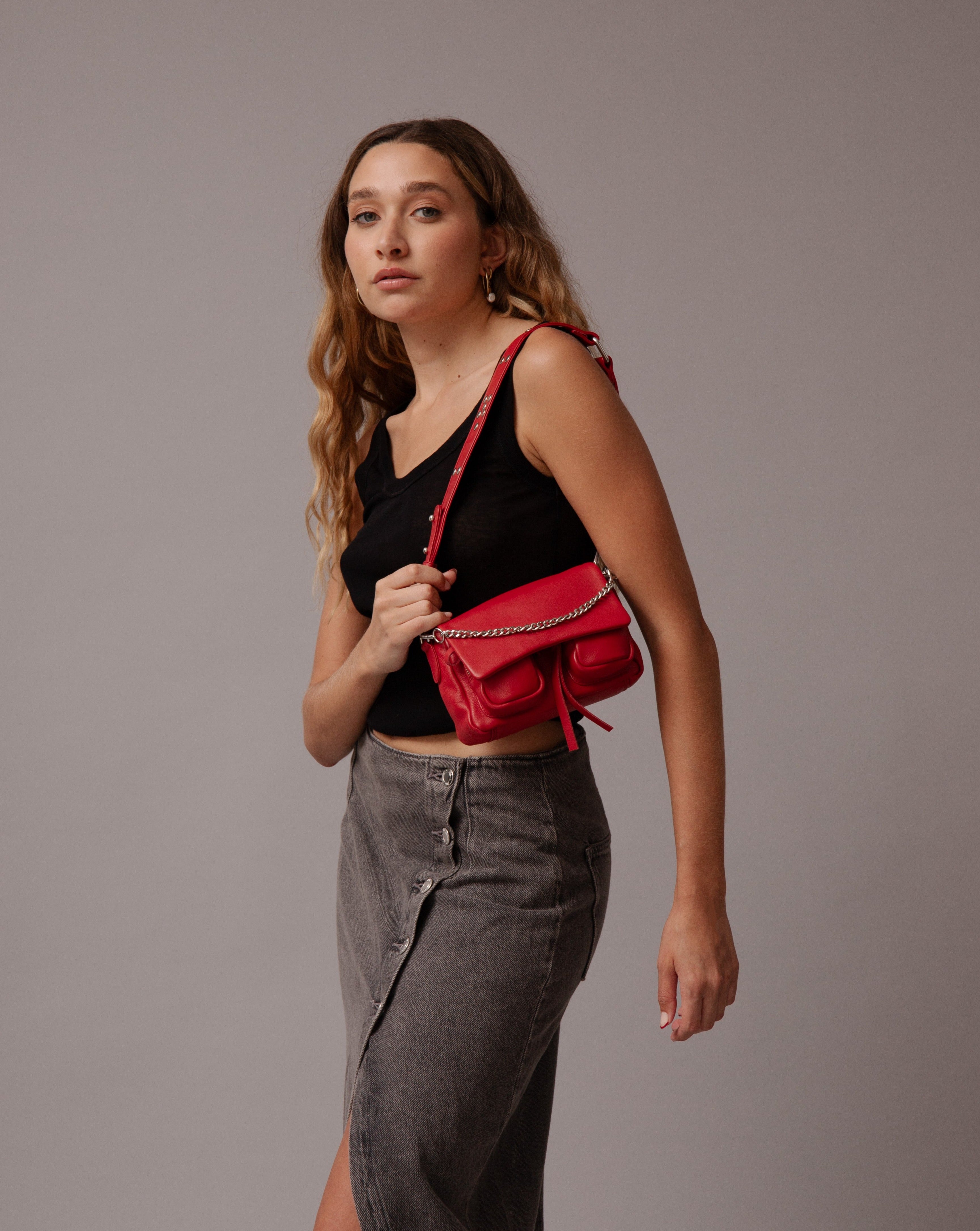 Max mini red coral leather bag, on model worn as shoulderbag