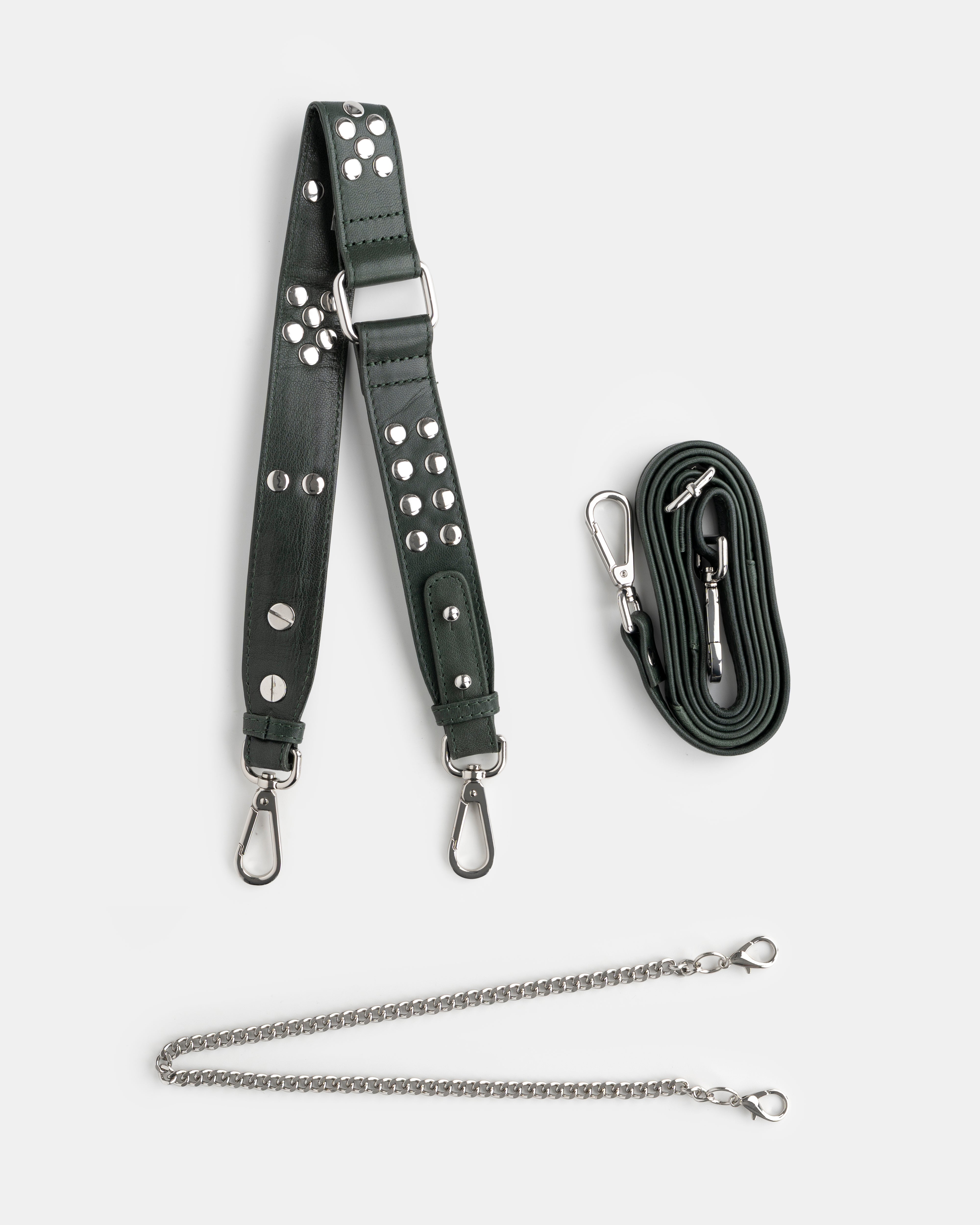 green leather strap with silver studs and hardware on a white background